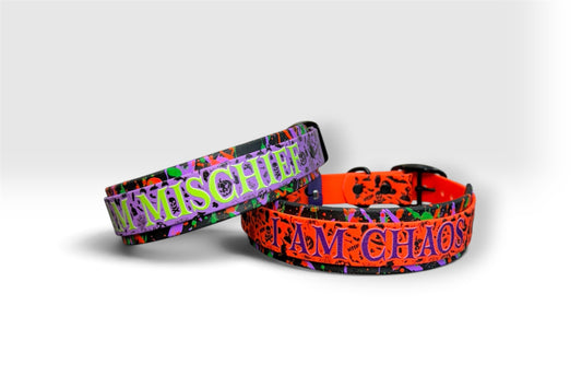 Seasonal collars — I Am Mischief in purple and I Am Chaos in orange Halloween splatter, on white